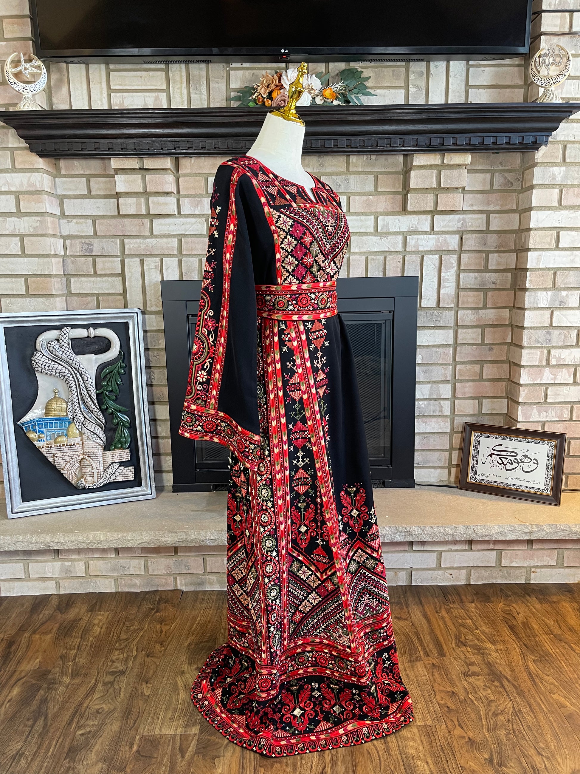 palestinian dress Embroidered Elegance Combines Tradition and Modern Style What makes this dress truly special is the intricate tatreez embroiderya centuries Black Gold Aisha Palestinian Thobe